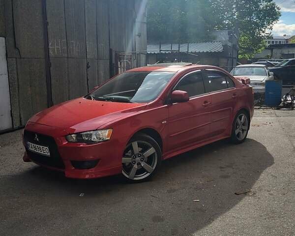 Червоний Міцубісі Lancer, об'ємом двигуна 2 л та пробігом 140 тис. км за 8500 $, фото 2 на Automoto.ua