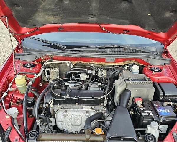 Червоний Міцубісі Lancer, об'ємом двигуна 1.6 л та пробігом 220 тис. км за 5800 $, фото 16 на Automoto.ua
