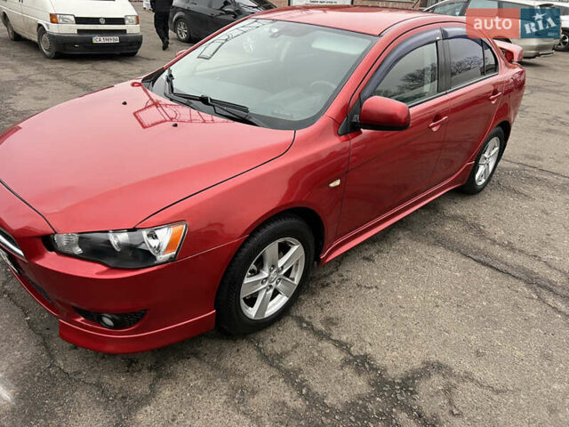 Красный Мицубиси Лансер, объемом двигателя 2 л и пробегом 330 тыс. км за 5250 $, фото 11 на Automoto.ua