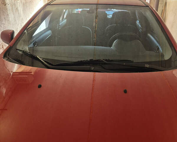 Красный Мицубиси Лансер, объемом двигателя 2 л и пробегом 65 тыс. км за 9300 $, фото 3 на Automoto.ua