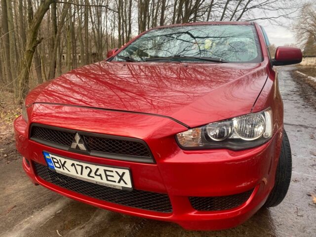 Червоний Міцубісі Lancer, об'ємом двигуна 0 л та пробігом 124 тис. км за 7555 $, фото 14 на Automoto.ua