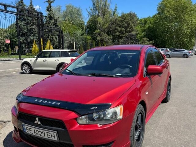 Червоний Міцубісі Lancer, об'ємом двигуна 2 л та пробігом 255 тис. км за 5200 $, фото 2 на Automoto.ua