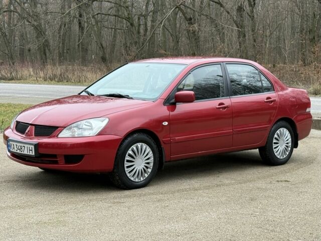 Червоний Міцубісі Lancer, об'ємом двигуна 1.6 л та пробігом 220 тис. км за 4600 $, фото 3 на Automoto.ua