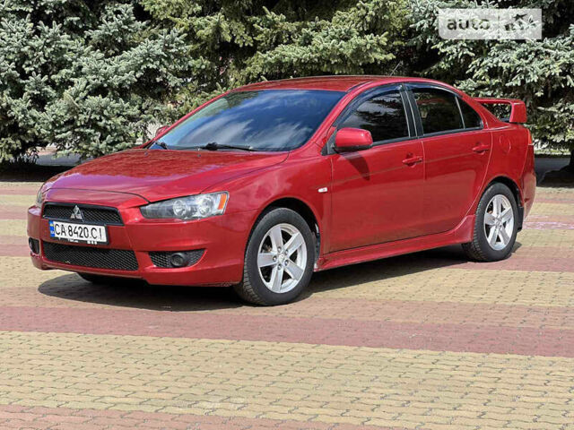 Червоний Міцубісі Lancer, об'ємом двигуна 2 л та пробігом 250 тис. км за 6700 $, фото 1 на Automoto.ua