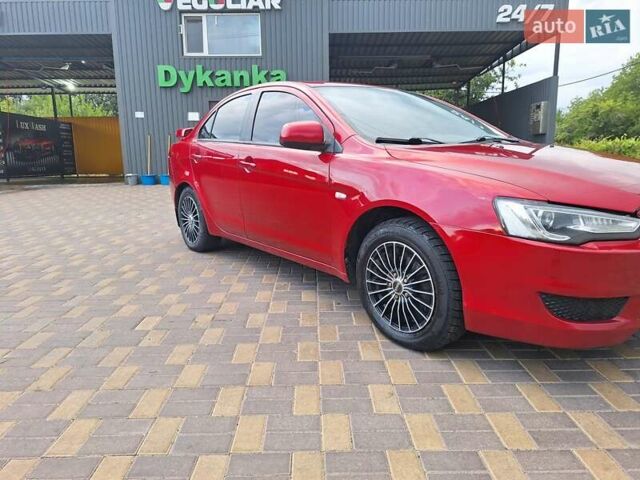 Красный Мицубиси Лансер, объемом двигателя 1.5 л и пробегом 227 тыс. км за 6700 $, фото 9 на Automoto.ua