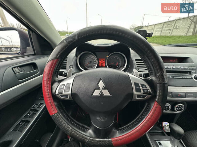 Червоний Міцубісі Lancer, об'ємом двигуна 2 л та пробігом 366 тис. км за 6500 $, фото 31 на Automoto.ua