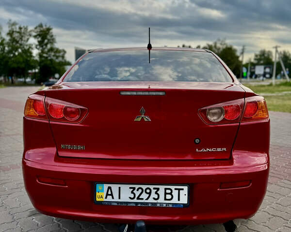 Красный Мицубиси Лансер, объемом двигателя 2 л и пробегом 365 тыс. км за 5000 $, фото 7 на Automoto.ua