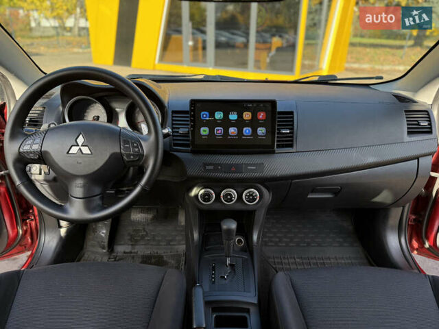 Червоний Міцубісі Lancer, об'ємом двигуна 2 л та пробігом 215 тис. км за 6500 $, фото 10 на Automoto.ua