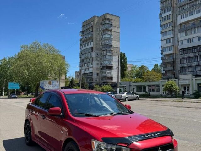 Червоний Міцубісі Lancer, об'ємом двигуна 2 л та пробігом 255 тис. км за 5200 $, фото 5 на Automoto.ua