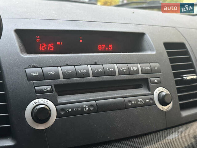 Червоний Міцубісі Lancer, об'ємом двигуна 2 л та пробігом 203 тис. км за 8000 $, фото 39 на Automoto.ua