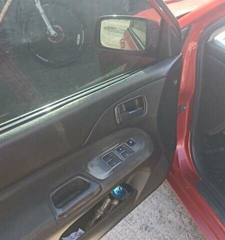 Мицубиси Лансер 2008 в Львове на Automoto.ua Красный Мицубиси Лансер, объемом двигателя 1.58 л и пробегом 280 тыс. км за 3200 $, фото 16 на Automoto.ua