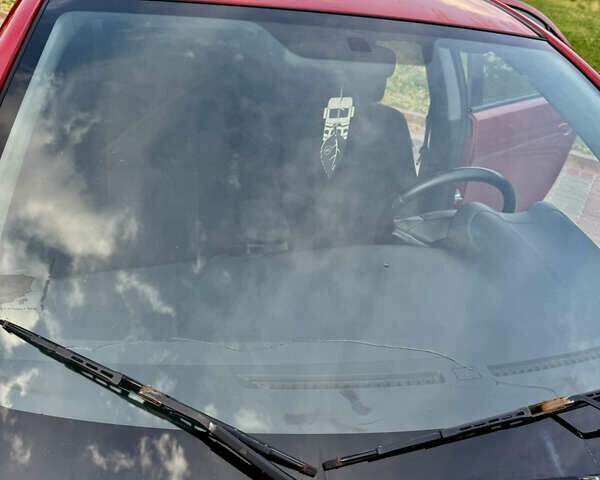 Красный Мицубиси Лансер, объемом двигателя 2 л и пробегом 365 тыс. км за 5000 $, фото 20 на Automoto.ua