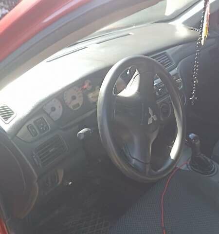 Мицубиси Лансер 2008 в Львове на Automoto.ua Красный Мицубиси Лансер, объемом двигателя 1.58 л и пробегом 280 тыс. км за 3200 $, фото 14 на Automoto.ua