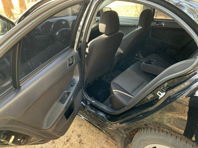 Мицубиси Лансер 2008 в Полтаве на Automoto.ua Красный Мицубиси Лансер, объемом двигателя 2 л и пробегом 170 тыс. км за 7200 $, фото 6 на Automoto.ua