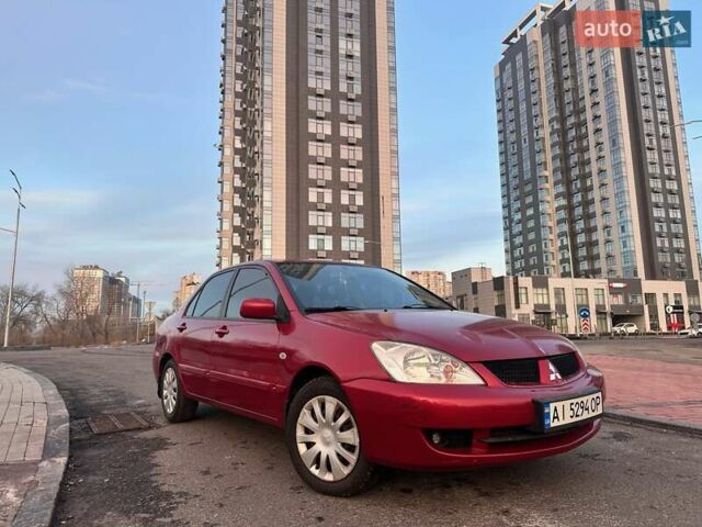 Червоний Міцубісі Lancer, об'ємом двигуна 1.6 л та пробігом 141 тис. км за 4700 $, фото 1 на Automoto.ua