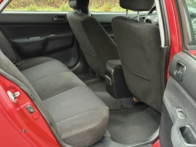 Червоний Міцубісі Lancer, об'ємом двигуна 1.6 л та пробігом 220 тис. км за 4600 $, фото 17 на Automoto.ua