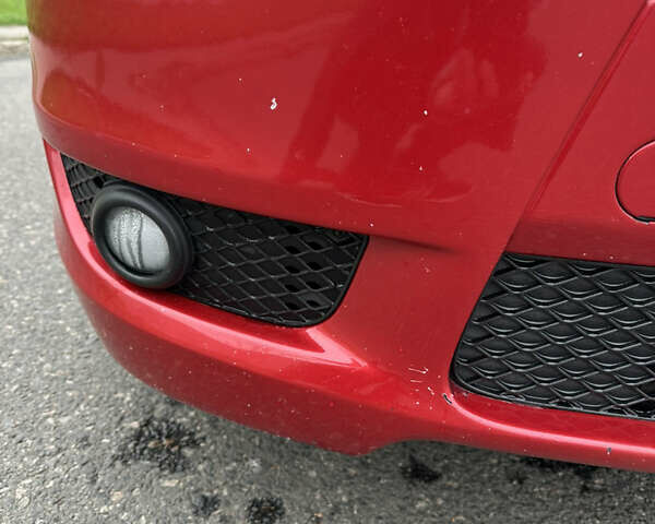 Червоний Міцубісі Lancer, об'ємом двигуна 2 л та пробігом 366 тис. км за 6500 $, фото 29 на Automoto.ua