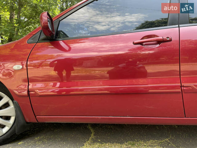 Червоний Міцубісі Lancer, об'ємом двигуна 1.6 л та пробігом 270 тис. км за 5699 $, фото 13 на Automoto.ua