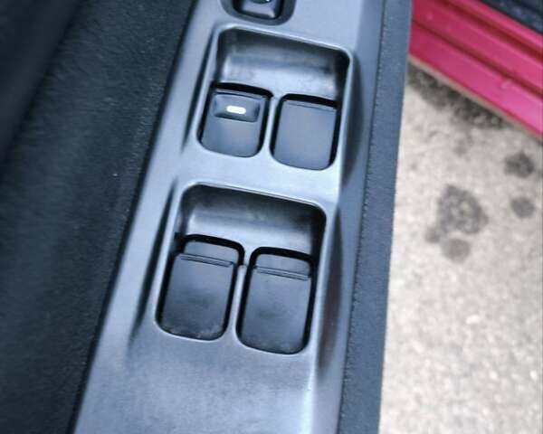 Червоний Міцубісі Lancer, об'ємом двигуна 1.58 л та пробігом 140 тис. км за 6000 $, фото 32 на Automoto.ua