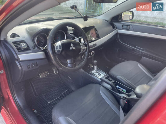 Червоний Міцубісі Lancer, об'ємом двигуна 2 л та пробігом 179 тис. км за 6499 $, фото 10 на Automoto.ua