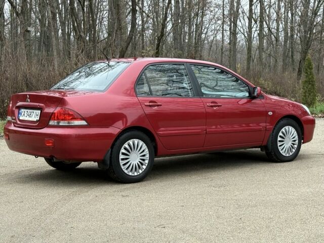 Червоний Міцубісі Lancer, об'ємом двигуна 1.6 л та пробігом 220 тис. км за 4600 $, фото 7 на Automoto.ua