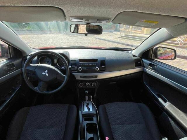 Червоний Міцубісі Lancer, об'ємом двигуна 1.5 л та пробігом 211 тис. км за 6900 $, фото 13 на Automoto.ua
