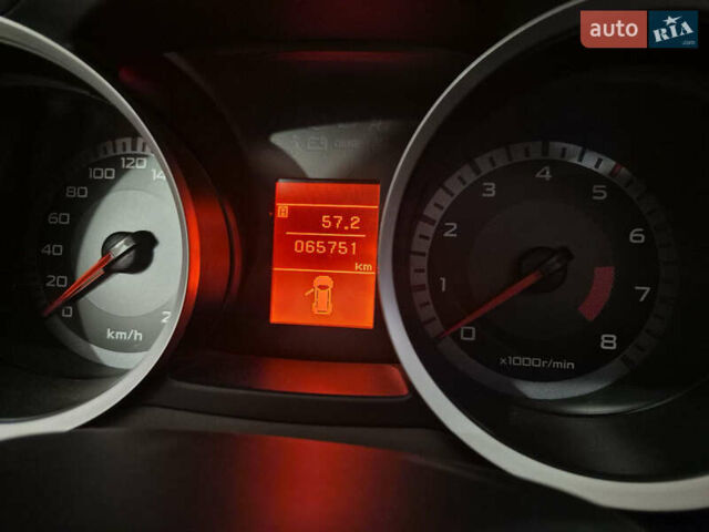 Красный Мицубиси Лансер, объемом двигателя 2 л и пробегом 65 тыс. км за 9300 $, фото 18 на Automoto.ua