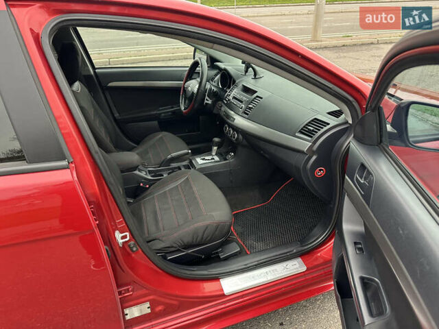 Червоний Міцубісі Lancer, об'ємом двигуна 2 л та пробігом 366 тис. км за 6500 $, фото 11 на Automoto.ua