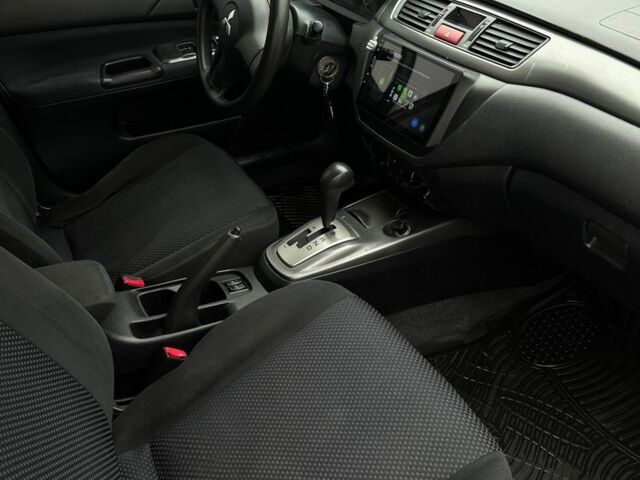 Червоний Міцубісі Lancer, об'ємом двигуна 1.6 л та пробігом 224 тис. км за 4300 $, фото 6 на Automoto.ua