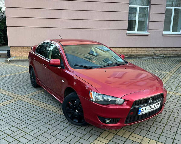 Красный Мицубиси Лансер, объемом двигателя 2 л и пробегом 143 тыс. км за 5200 $, фото 8 на Automoto.ua