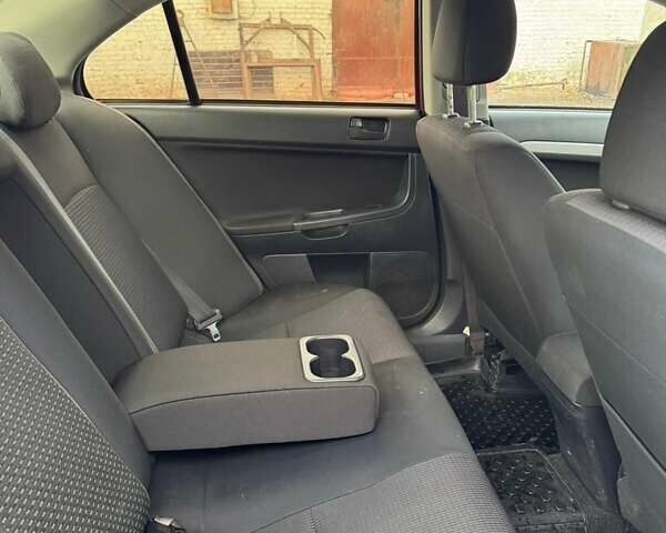 Червоний Міцубісі Lancer, об'ємом двигуна 1.5 л та пробігом 190 тис. км за 6700 $, фото 14 на Automoto.ua