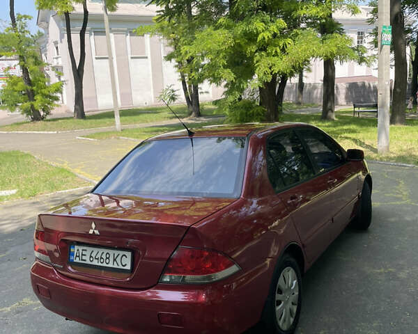 Червоний Міцубісі Lancer, об'ємом двигуна 1.6 л та пробігом 270 тис. км за 5699 $, фото 4 на Automoto.ua
