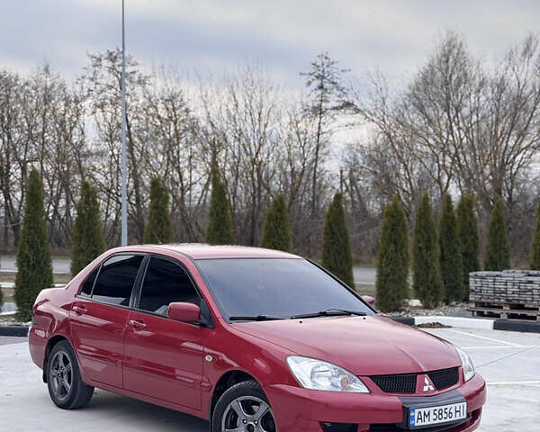 Красный Мицубиси Лансер, объемом двигателя 1.6 л и пробегом 276 тыс. км за 4550 $, фото 7 на Automoto.ua