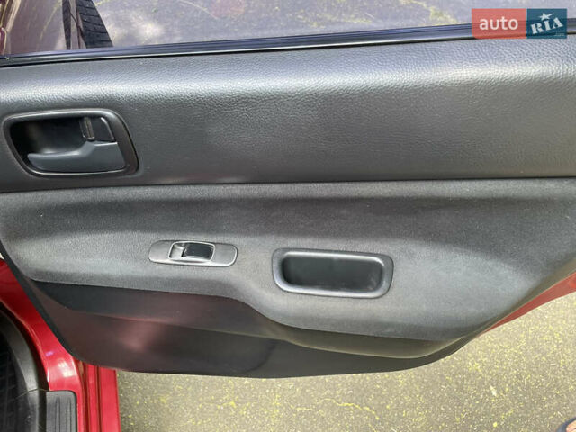 Червоний Міцубісі Lancer, об'ємом двигуна 1.6 л та пробігом 270 тис. км за 5699 $, фото 60 на Automoto.ua