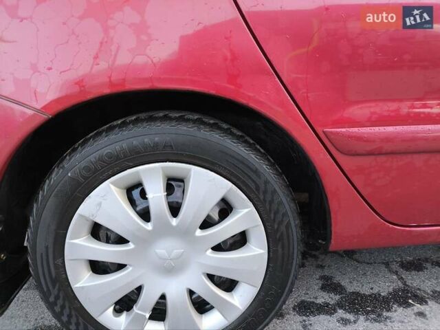 Червоний Міцубісі Lancer, об'ємом двигуна 1.58 л та пробігом 140 тис. км за 6000 $, фото 15 на Automoto.ua