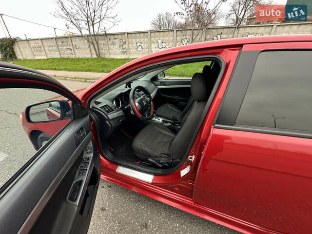 Червоний Міцубісі Lancer, об'ємом двигуна 2 л та пробігом 366 тис. км за 6500 $, фото 5 на Automoto.ua