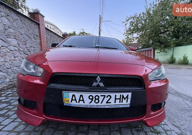 Міцубісі Lancer 2008 у Києві на Automoto.ua Червоний Міцубісі Lancer, об'ємом двигуна 2 л та пробігом 250 тис. км за 7000 $, фото 1 на Automoto.ua