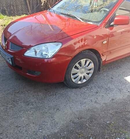 Мицубиси Лансер 2008 в Львове на Automoto.ua Красный Мицубиси Лансер, объемом двигателя 1.58 л и пробегом 280 тыс. км за 3200 $, фото 28 на Automoto.ua