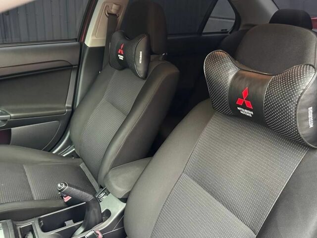 Червоний Міцубісі Lancer, об'ємом двигуна 2 л та пробігом 137 тис. км за 8500 $, фото 6 на Automoto.ua