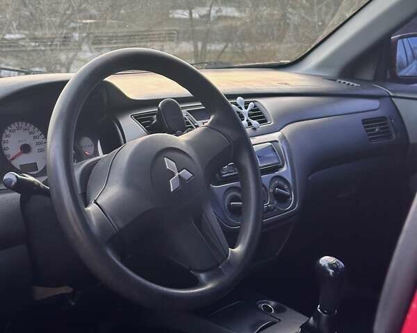Червоний Міцубісі Lancer, об'ємом двигуна 1.6 л та пробігом 141 тис. км за 4700 $, фото 8 на Automoto.ua