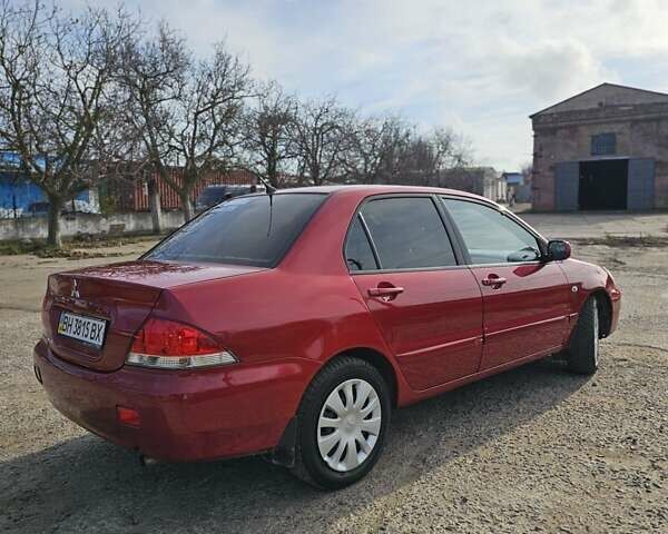 Червоний Міцубісі Lancer, об'ємом двигуна 1.6 л та пробігом 220 тис. км за 5800 $, фото 3 на Automoto.ua