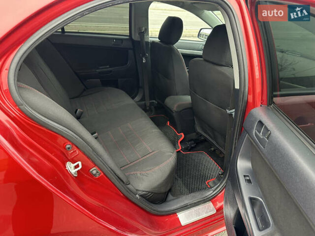 Червоний Міцубісі Lancer, об'ємом двигуна 2 л та пробігом 366 тис. км за 6500 $, фото 8 на Automoto.ua