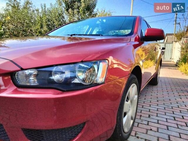 Міцубісі Lancer 2008 у Житомирі на Automoto.ua Червоний Міцубісі Lancer, об'ємом двигуна 1.5 л та пробігом 155 тис. км за 6200 $, фото 6 на Automoto.ua
