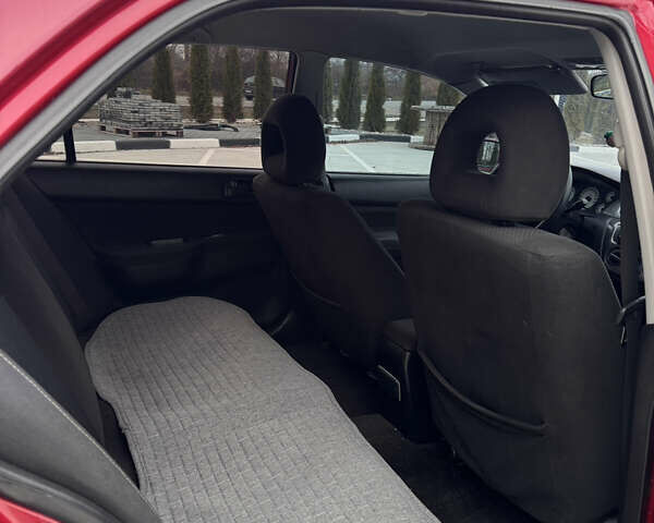 Красный Мицубиси Лансер, объемом двигателя 1.6 л и пробегом 276 тыс. км за 4550 $, фото 13 на Automoto.ua