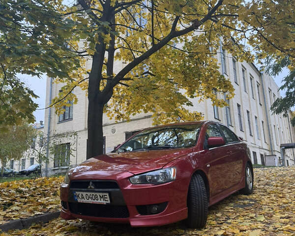 Червоний Міцубісі Lancer, об'ємом двигуна 2 л та пробігом 203 тис. км за 8000 $, фото 2 на Automoto.ua