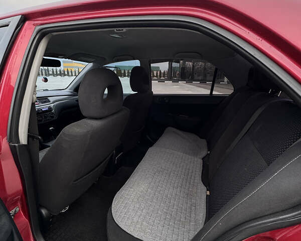 Красный Мицубиси Лансер, объемом двигателя 1.6 л и пробегом 276 тыс. км за 4550 $, фото 12 на Automoto.ua