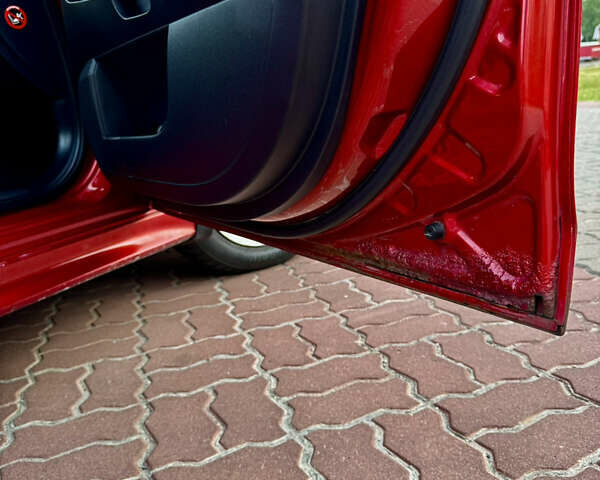 Красный Мицубиси Лансер, объемом двигателя 2 л и пробегом 365 тыс. км за 5000 $, фото 24 на Automoto.ua