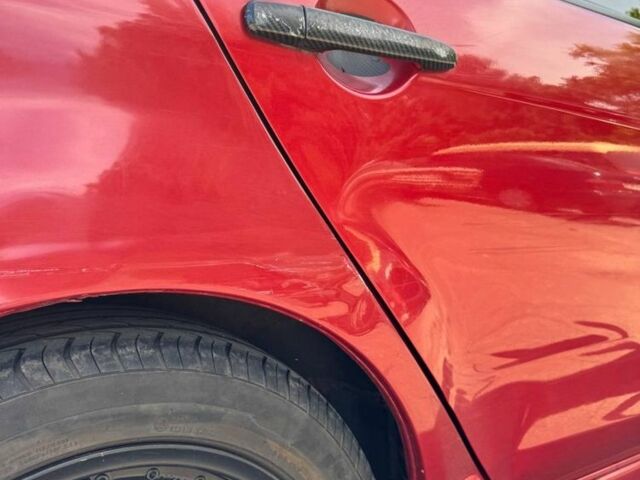 Червоний Міцубісі Lancer, об'ємом двигуна 2 л та пробігом 255 тис. км за 5200 $, фото 3 на Automoto.ua