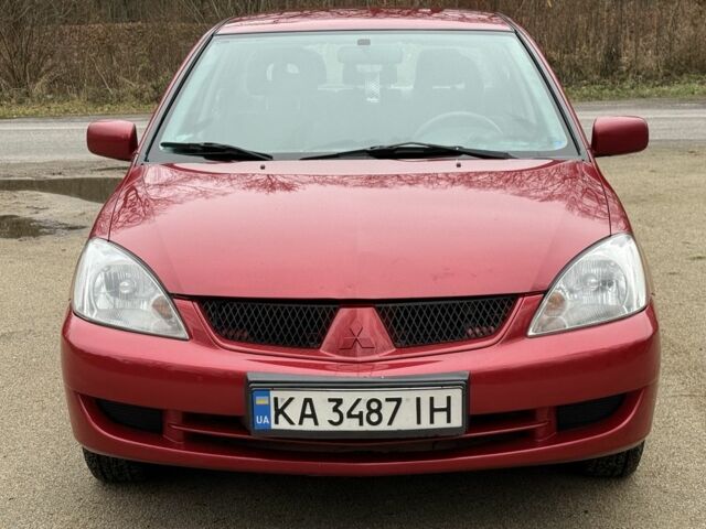 Червоний Міцубісі Lancer, об'ємом двигуна 1.6 л та пробігом 220 тис. км за 4600 $, фото 10 на Automoto.ua