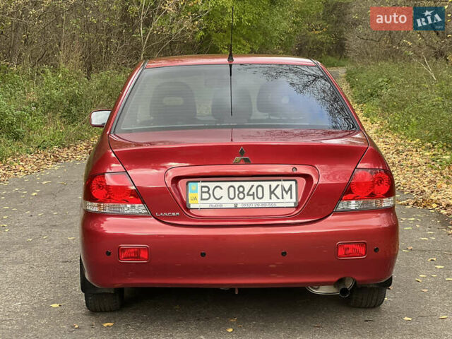 Міцубісі Lancer 2009 у Вінниці на Automoto.ua Червоний Міцубісі Lancer, об'ємом двигуна 1.58 л та пробігом 133 тис. км за 6750 $, фото 10 на Automoto.ua